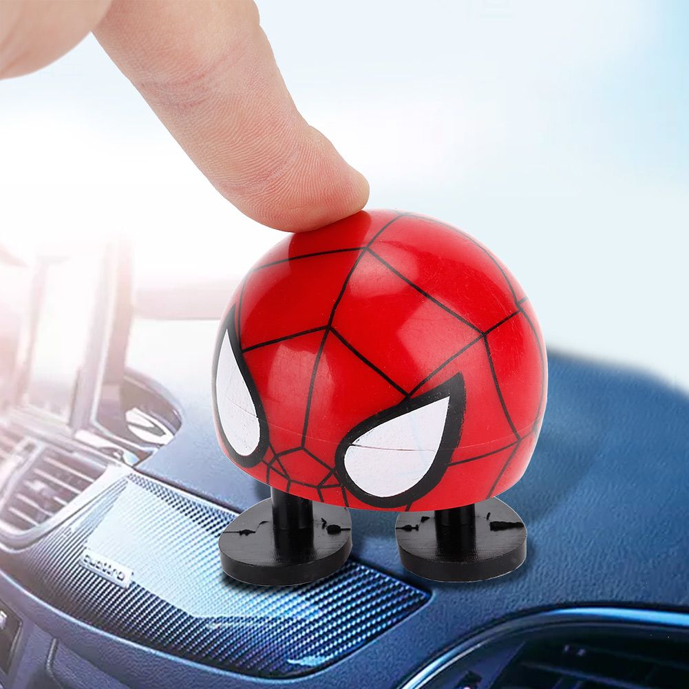 Cartoon wobble head doll toy ornament with shaking head, suitable for ride-on car decoration, by Everything Baby.