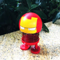 Shaking head toy ornament featuring cartoon doll head with wobble action, suitable for ride-on car decoration, by Everything Baby.
