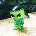 Cartoon wobble head doll ornament with a shaking head, designed for car decoration, by Everything Baby, featuring a playful robot theme.