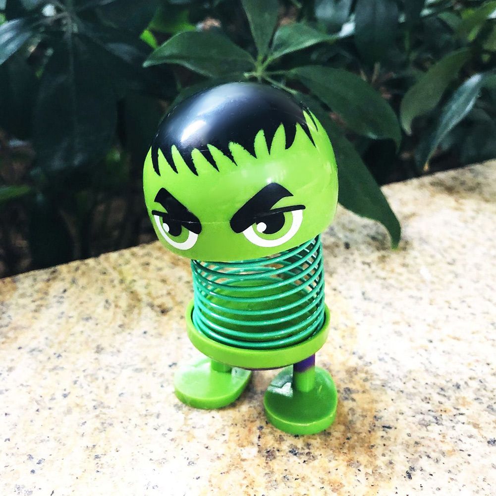 Cartoon wobble head doll ornament with a shaking head, designed for car decoration, by Everything Baby, featuring a playful robot theme.