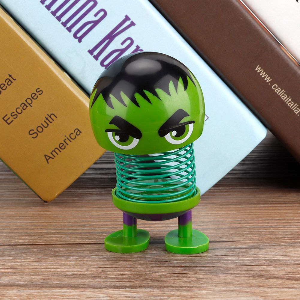 Cartoon wobble head doll toy ornament featuring a shaking head, designed for ride-on car decoration by Everything Baby