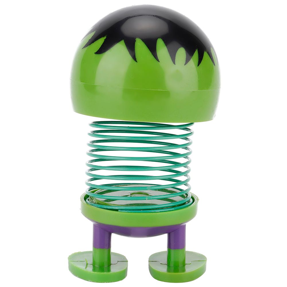 Cartoon doll head wobble toy ornament on ride-on car, featuring a playful robot design for kids' vehicle decoration.