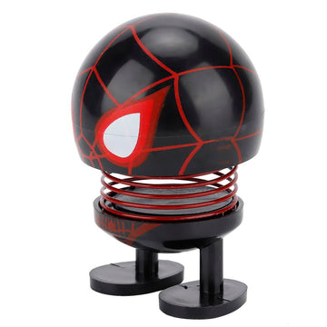 Cute wobble head cartoon doll ornament featuring a shaking head design, ideal for car decoration and children's ride-on cars.