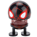 Cartoon wobble head robot doll ornament with shaking head, suitable for ride-on car decoration, by Everything Baby.