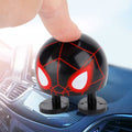 Cartoon doll head wobble toy ornament with shaking head design, suitable for ride-on car decoration by Everything Baby.