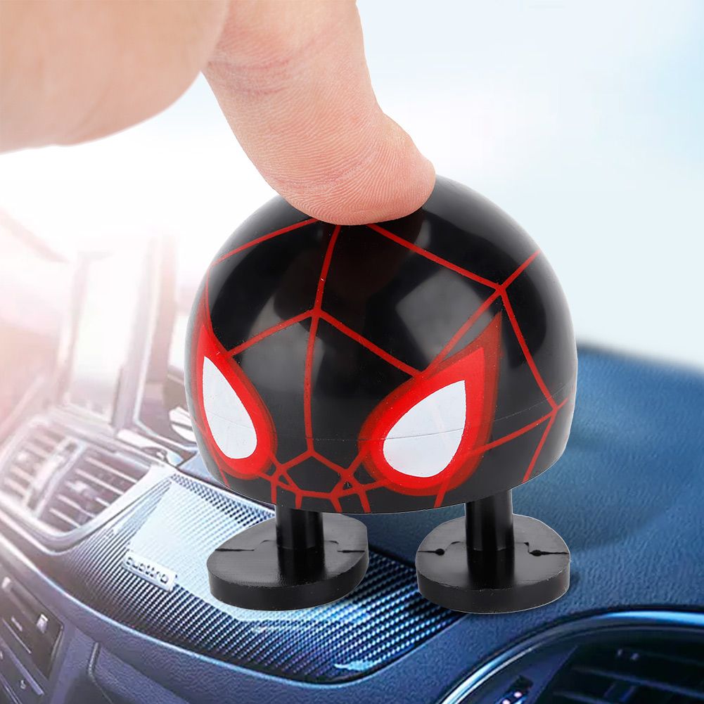 Cartoon doll head wobble toy ornament with shaking head design, suitable for ride-on car decoration by Everything Baby.