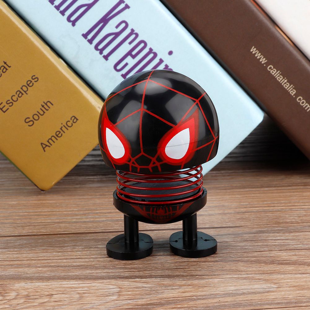 Shaking head cartoon doll ornament with wobble head, suitable for car decoration, by Everything Baby, featuring a playful robot design.