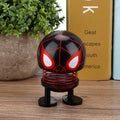 Baby toy with a cartoon doll head and wobble effect, designed as a robot car ornament for kids' ride-on cars by Everything Baby.
