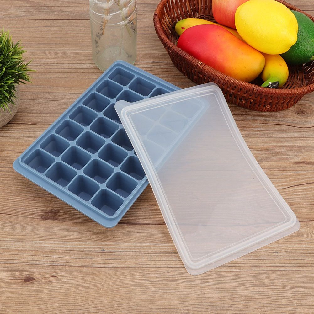Blue 28-grid silicone ice tray and pudding mold with lid, ideal for baking, freezing chocolates, or baby feeding purposes.