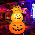 Three 3.9FT inflatable Halloween pumpkins with LEDs, outdoor yard decorations for Halloween parties and garden decor.