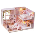 Wooden miniature dollhouse kit with furniture and LED lights, perfect for pretend play, designed for kids by Everything Baby.