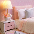 Wooden miniature dollhouse kit with furniture and LED lights, hand-assembled toy set for pretend play, suitable for kids.