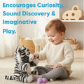 Soft plush interactive tiger toy for babies, featuring feeding and sleeping simulation functions by Everything Baby.