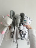 White plush Ellie the Elephant musical toy from Everything Baby, featuring a soft comforter and gentle lullabies for babies and kids.