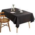 Black waterproof rectangle tablecloth with wrinkle-free fabric, suitable for indoor and outdoor dining, 140x180cm.