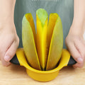 Two mango slicers and peelers with stainless steel blades, ergonomic handles, perfect for cutting and dividing large mangoes.