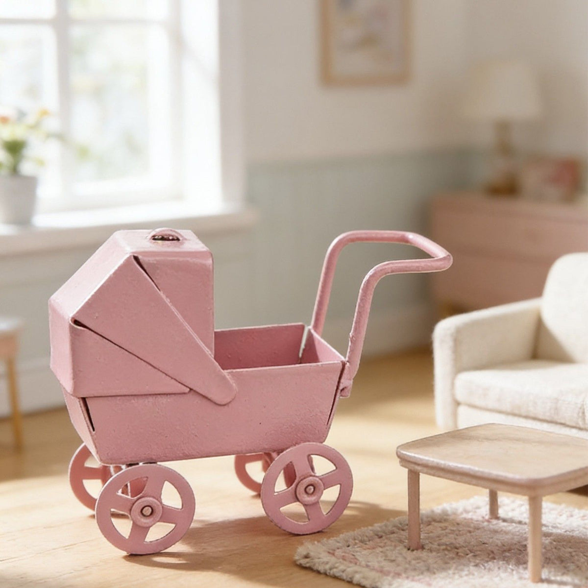 Pink mini baby stroller carriage basket, decorative scene accessory for kids' furniture, iron baby stroller model, adorable and detailed.