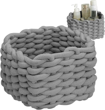 Small grey cotton rope woven storage basket for baby and kids' rooms, ideal for organizing toys and little items.