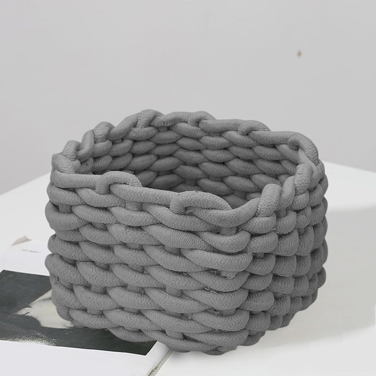 Gray cotton rope woven storage basket for small toys and items, ideal as a cute nursery or bedroom organizer for kids.