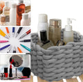 Gray cotton rope woven storage basket for baby and kids' rooms, ideal for organizing toys, books, and small items.