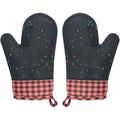 Pair of pink silicone oven mitts with cotton lining, non-slip baking mittens, ideal for cooking and kitchen decor, 2-piece set.