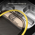 Stainless steel bento box with four compartments, leakproof lunch container for kids and adults, ideal for school and outdoor meals.