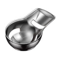 Two stainless steel egg yolk separators for raw eggs, ideal for baking and cooking, with easy-to-use design.