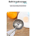 Stainless steel commercial thumb press food disher and ice cream scoop with purple handle, designed for easy serving of fruit and food.