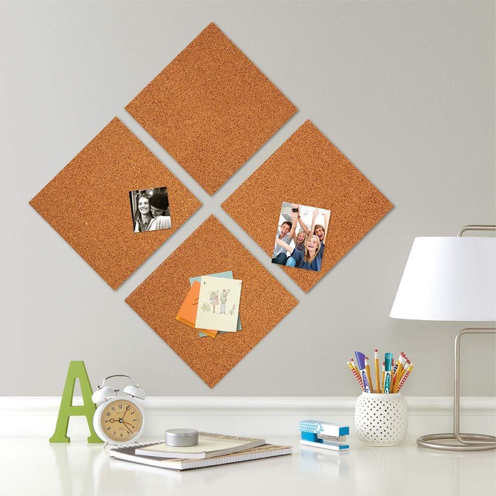 Eight self-adhesive Quartet cork tiles, 12x12 inches, for wall pin boards, suitable for kids' building and craft projects.