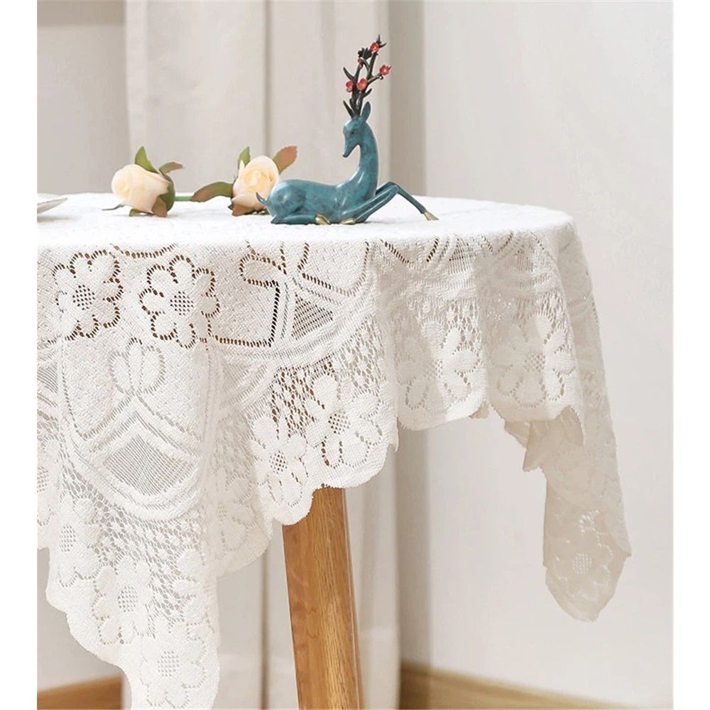 White handmade crochet lace square table runner with embroidered details, designed for coffee tables and dresser decor.