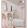 Waterproof large toiletry bag by Everything Baby, foldable travel organizer for men and women, with multiple compartments.