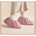 Two pairs of reusable slide board shoe and boot covers for kids’ fitness and hockey slideboards, size 37-42, by Everything Baby.