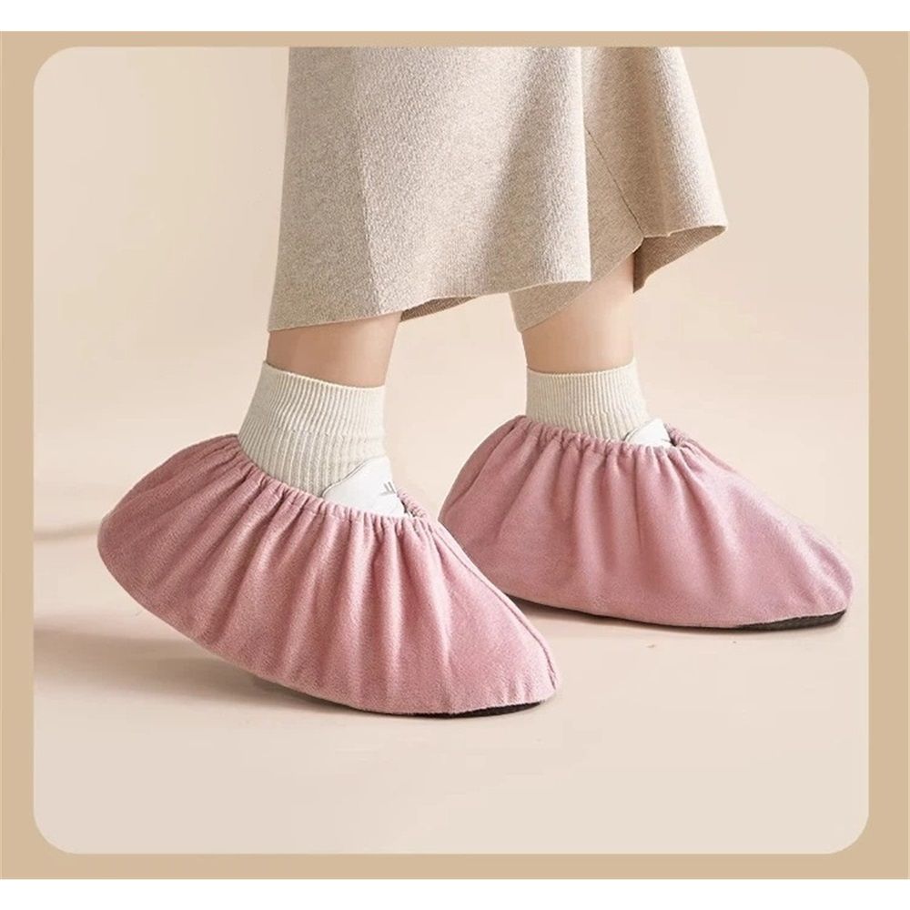 Two pairs of reusable slide board shoe and boot covers for kids’ fitness and hockey slideboards, size 37-42, by Everything Baby.