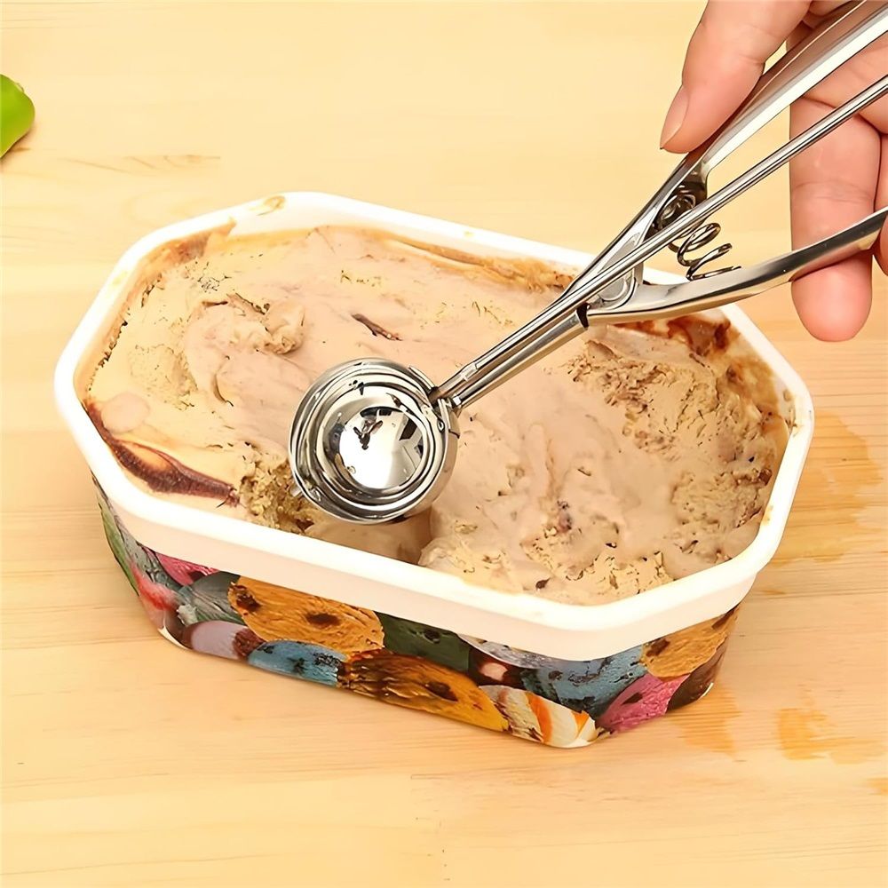 Stainless steel ice cream scoop with spring-loaded lever, ideal for sorbet, melon, and fruit serving, designed for efficient scooping.