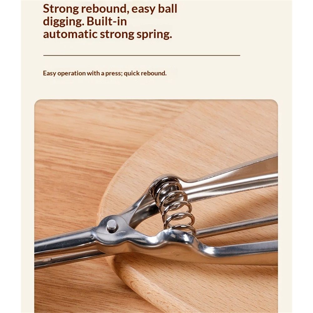 Stainless steel ice cream and fruit scoop with spring-loaded lever, ideal for sorbet, melon, and other frozen treats.