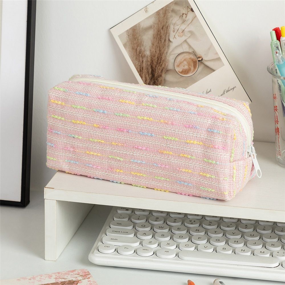 Pink luxury pen case with colorful lines, medium size, large capacity storage pouch for pencils and stationery, from Everything Baby.