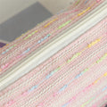 Pink luxury pen case with colorful lines, medium size, large capacity pencil pouch, stylish organizer for kids' pens and pencils.