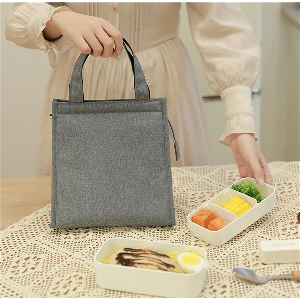 Gray insulated black lunch bag for men and women, reusable zipper tote lunch box from Everything Baby, suitable for kids and adults.