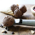 Stainless steel ice cream scooper with trigger release, heavy-duty metal scoop for frozen yogurt, gelato, and ice cream desserts.