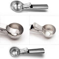 Stainless steel ice cream scooper with trigger release for frozen desserts, meatballs, and yogurt, dishwasher safe, heavy-duty design.