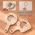Square magnifying glass for kids by Everything Baby, ideal for exploring insects and leaves during outdoor adventures.