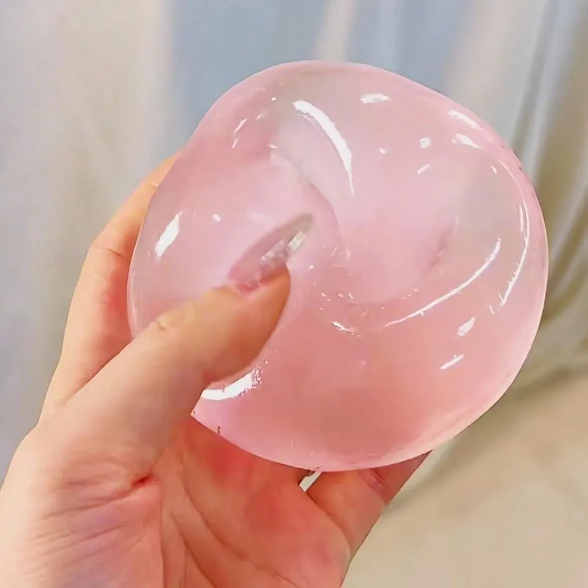Blue and pink moldable slow rebound coconut oil handmade squeezing ball for stress relief, ideal for babies and kids.
