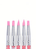 Pink acrylic nail art silicone brushes with dual heads for UV gel, carving, painting, and sculpting in manicures and nail designs.