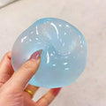 Blue moldable coconut oil scented squeezing ball, 6cm round stress relief toy for kids, ideal for holiday and birthday gifts.