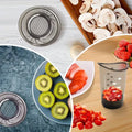 Fruits Slicer Cup by Everything Baby with removable blade, showing sliced strawberries, bananas, cucumbers, eggs, and onions.