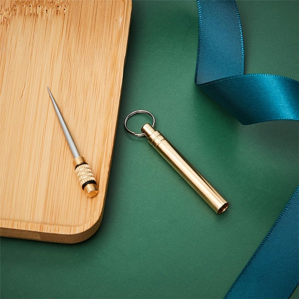 Golden stainless steel reusable pocket toothpick with key chain, portable dental pick for outdoor camping and everyday use.