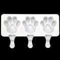 White silicone 2-piece cat paw popsicle mold for kids' pretend play, perfect for DIY summer ice treats, sticks not included.