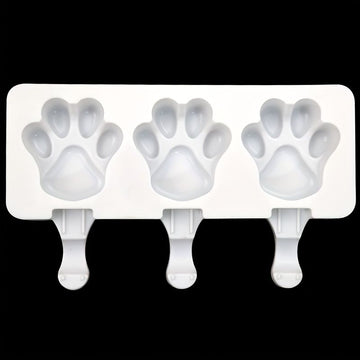 White silicone 2-piece cat paw popsicle mold for kids' pretend play, perfect for DIY summer ice treats, sticks not included.