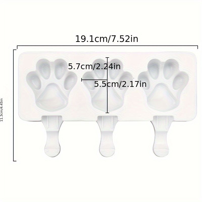 White silicone 2-piece cat paw popsicle mold for kids' summer pretend play, includes sticks not shown in the image.