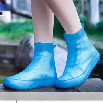 Baby girl's waterproof silicone shoe covers with non-slip grip, reusable outdoor sneaker protectors by Everything Baby.